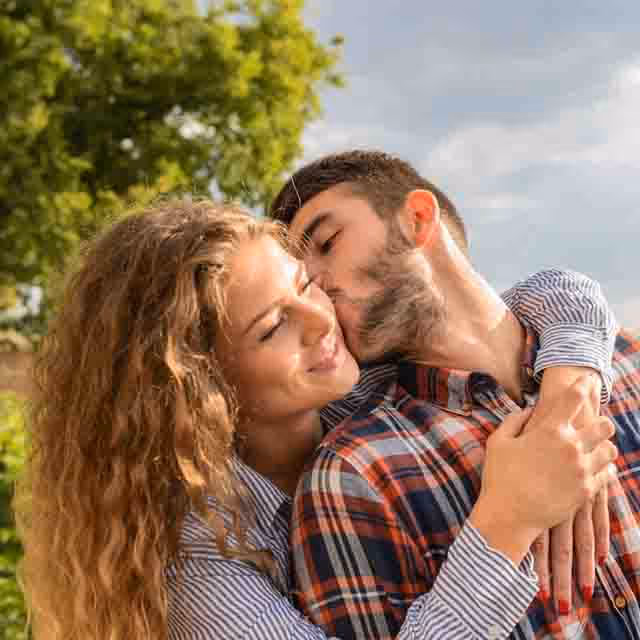 A couple sharing a close, affectionate moment